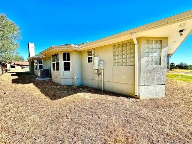 a view of a back yard of the building