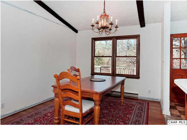 Dining room with vaulted ceilings