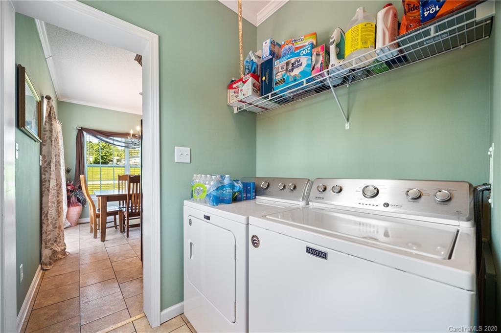 135 Ridge Field Drive Hendersonville, NC 28792 - Photo 11 of 28 a utility room with dryer and washer