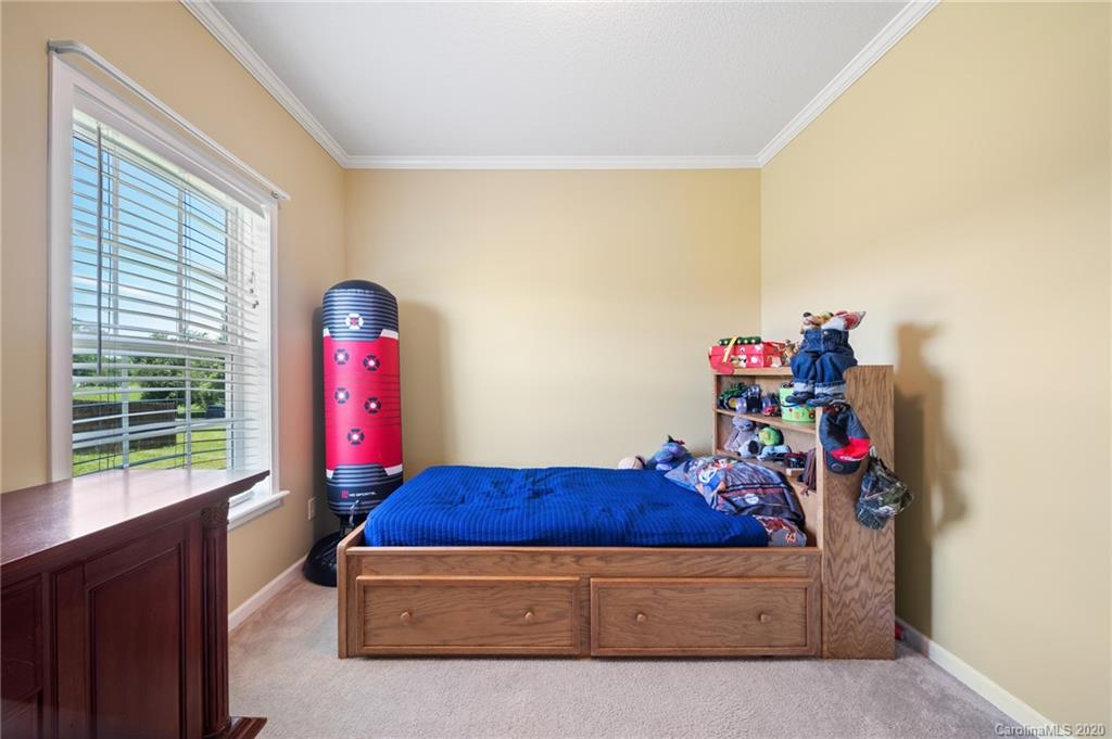 135 Ridge Field Drive Hendersonville, NC 28792 - Photo 16 of 28 a living room with furniture and a window