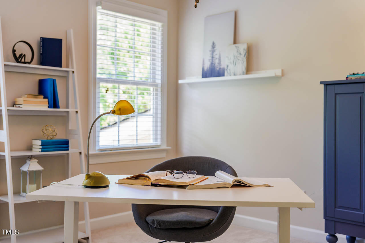 5515 South Roxboro Street, Unit 4 Durham, NC 27713 - Photo 24 of 34 a view of a workspace with furniture
