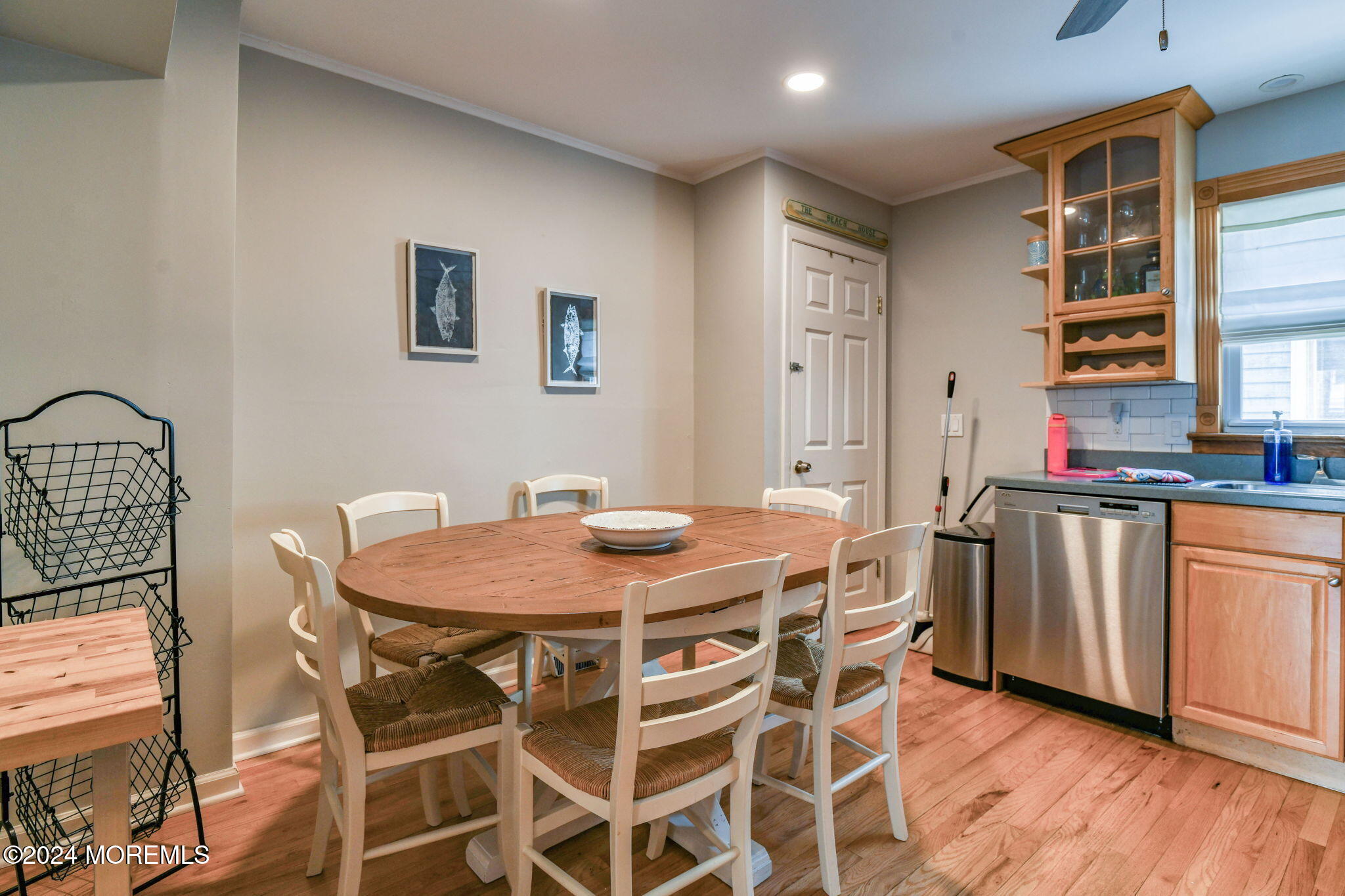 6 1/2 Embury Avenue Ocean Grove, NJ 07756 - Photo 11 of 24 a view of a dining room with furniture and wooden floor
