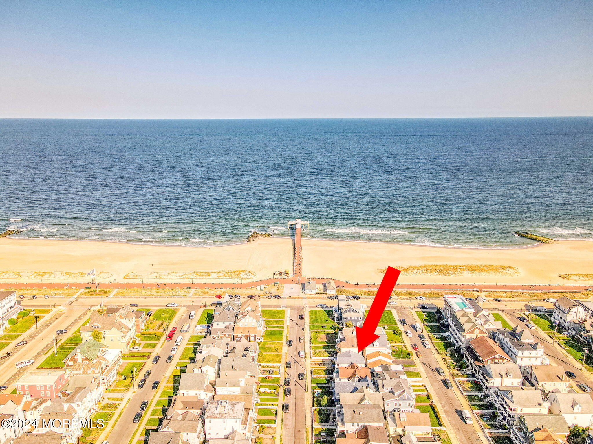 6 1/2 Embury Avenue Ocean Grove, NJ 07756 - Photo 2 of 24 a view of an empty room and wooden floor