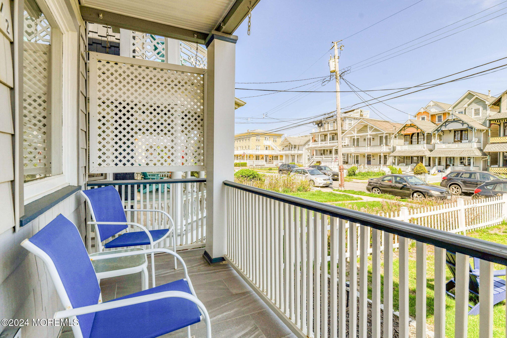 6 1/2 Embury Avenue Ocean Grove, NJ 07756 - Photo 24 of 24 a view of a balcony with chairs