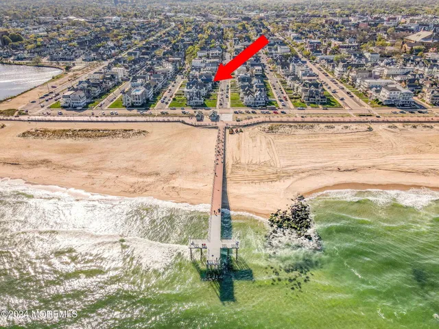 a view of a swimming pool with a lounge chairs