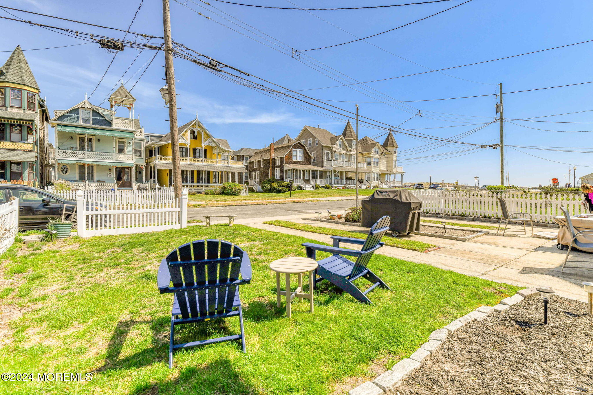 6 1/2 Embury Avenue Ocean Grove, NJ 07756 - Photo 4 of 24 a view of a swimming pool with a lounge chairs