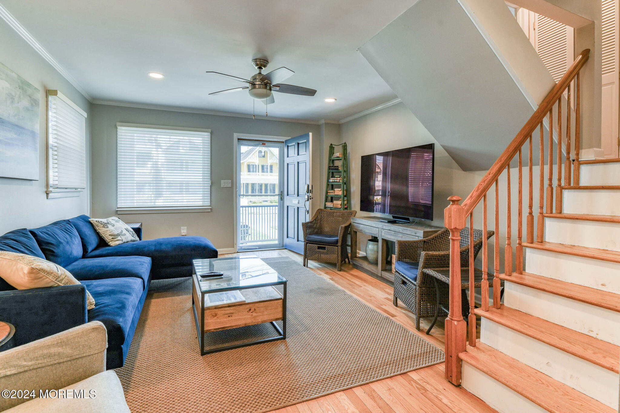 6 1/2 Embury Avenue Ocean Grove, NJ 07756 - Photo 7 of 24 a living room with furniture and a flat screen tv