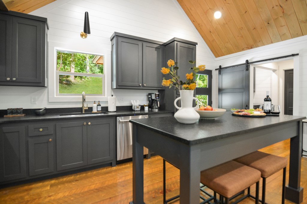 148 Haley Drive Cherry Log, GA 30522 - Photo 21 of 35 a kitchen with a sink cabinets and window