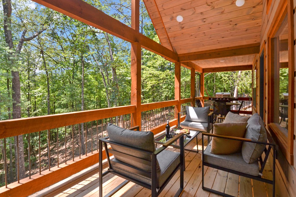 148 Haley Drive Cherry Log, GA 30522 - Photo 23 of 35 a view of a two chairs in the balcony