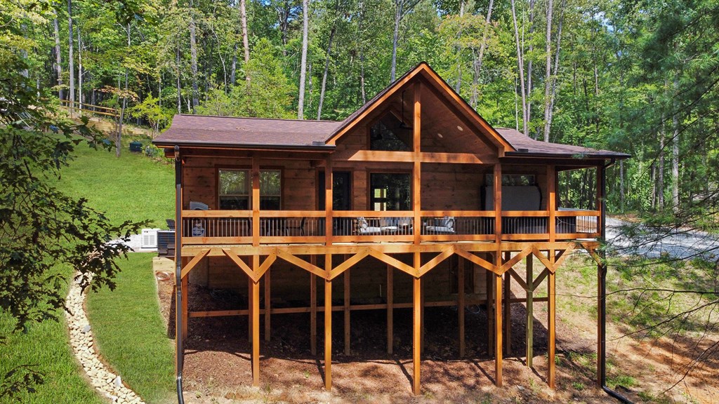 148 Haley Drive Cherry Log, GA 30522 - Photo 28 of 35 a front view of a house with balcony