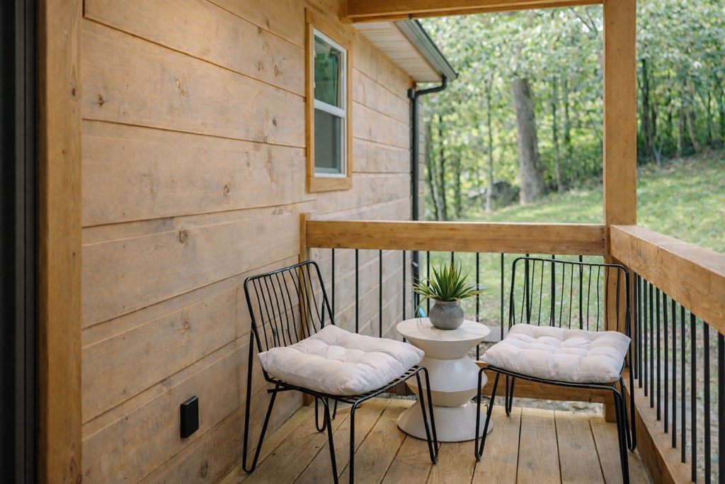 148 Haley Drive Cherry Log, GA 30522 - Photo 33 of 35 a view of a chairs and table in the balcony