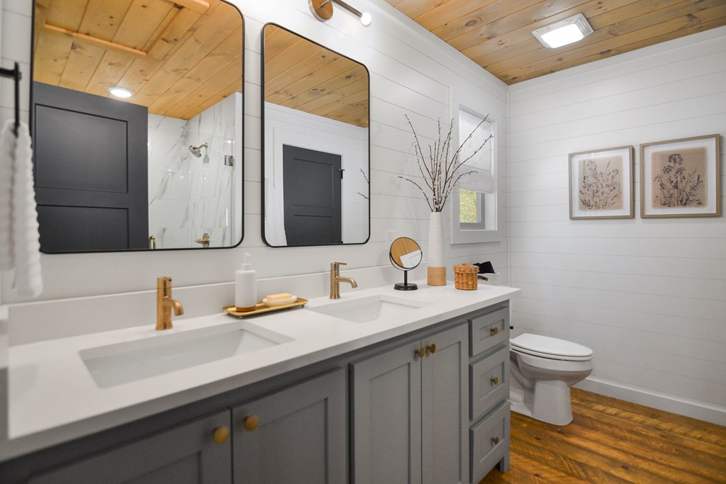 148 Haley Drive Cherry Log, GA 30522 - Photo 4 of 35 a bathroom with a sink and a toilet