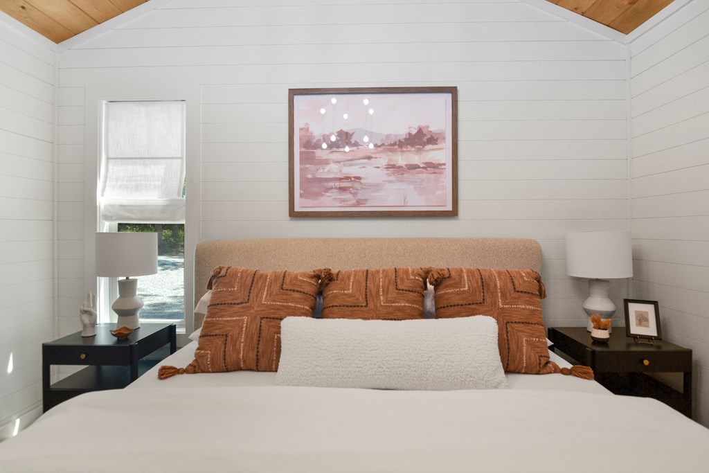 148 Haley Drive Cherry Log, GA 30522 - Photo 10 of 35 a bedroom with a large bed and a painting on the wall