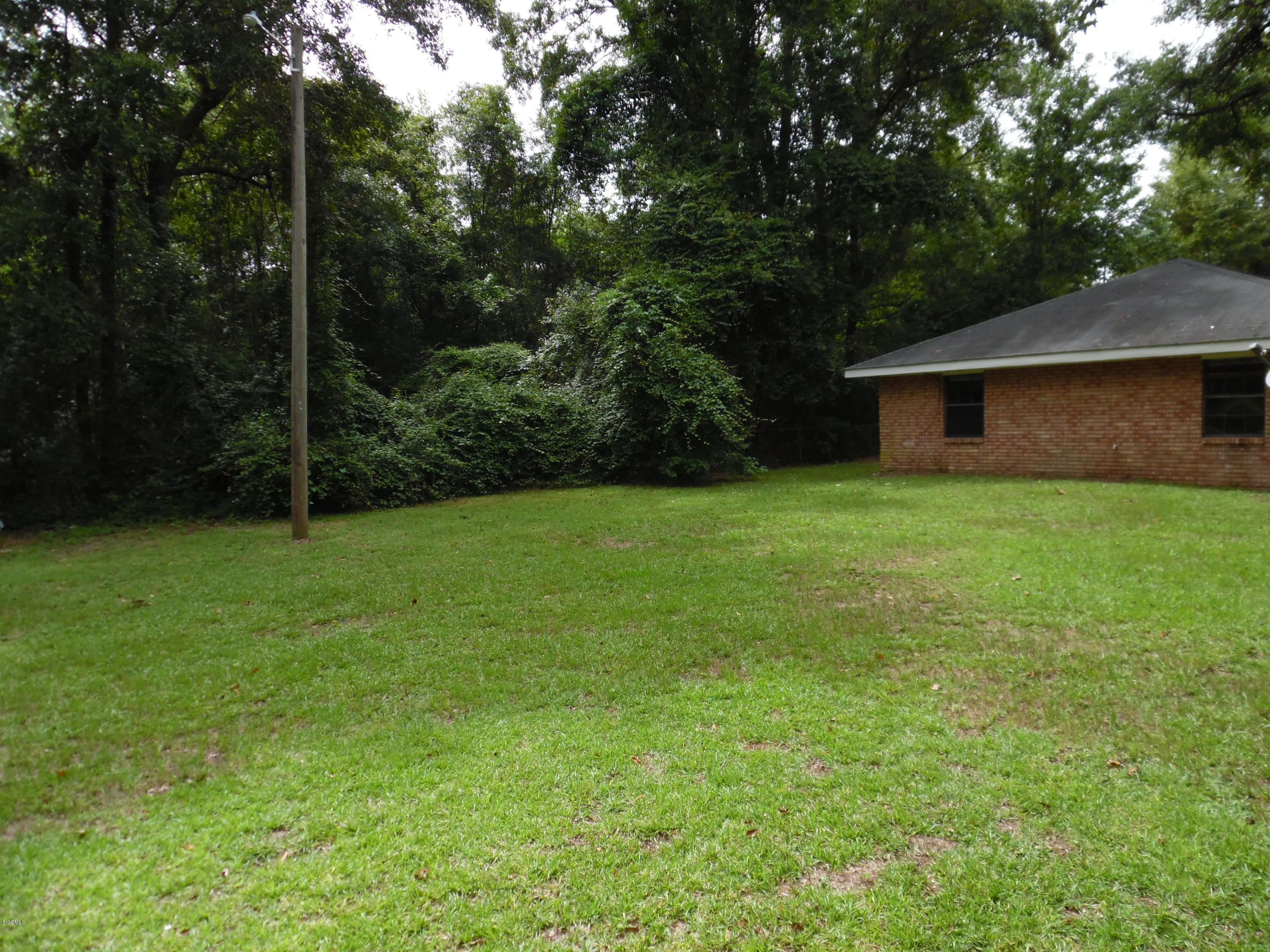 18 Blue Blackmon Road Picayune, MS 39466 - Photo 6 of 7 Front yard