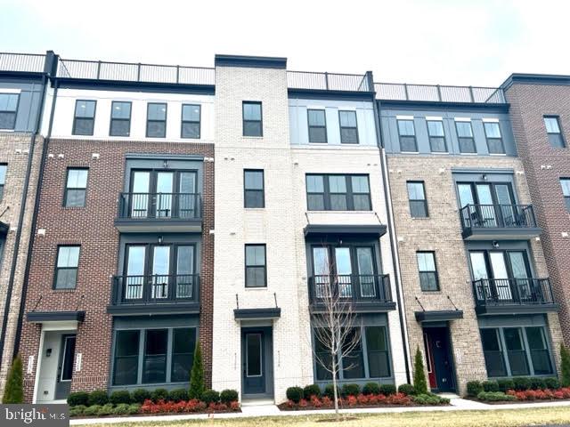 43264 Farringdon Square Ashburn, VA 20148 - Photo 1 of 27 a front view of a multi story building