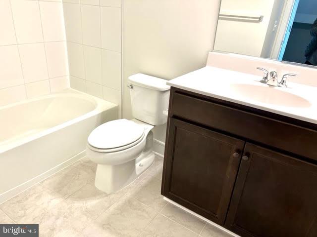 43264 Farringdon Square Ashburn, VA 20148 - Photo 23 of 27 a bathroom with a sink toilet and shower