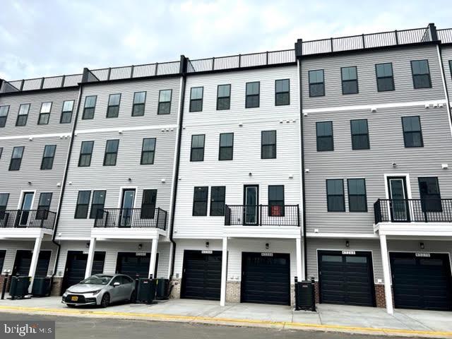 43264 Farringdon Square Ashburn, VA 20148 - Photo 27 of 27 a front view of a building with a lot of windows