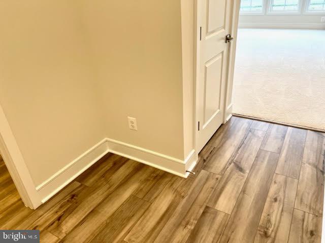 43264 Farringdon Square Ashburn, VA 20148 - Photo 3 of 27 a view of a room with wooden floor and a window