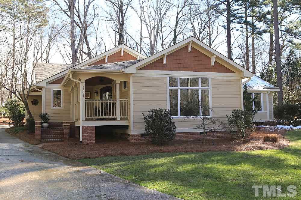 2601 Salisbury Plain Raleigh, NC 27613 - Photo 1 of 30 a front view of a house with garden