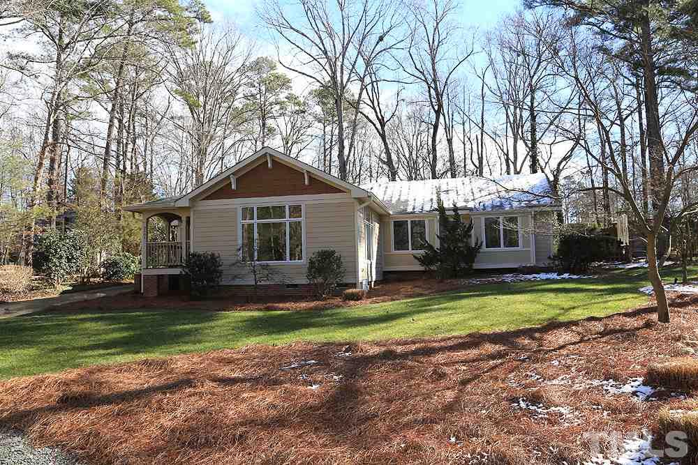 2601 Salisbury Plain Raleigh, NC 27613 - Photo 2 of 30 a front view of a house with a yard