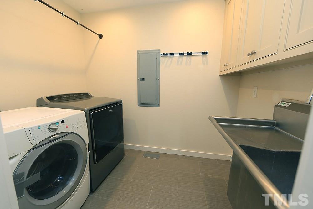 2601 Salisbury Plain Raleigh, NC 27613 - Photo 19 of 30 a utility room with dryer and washer