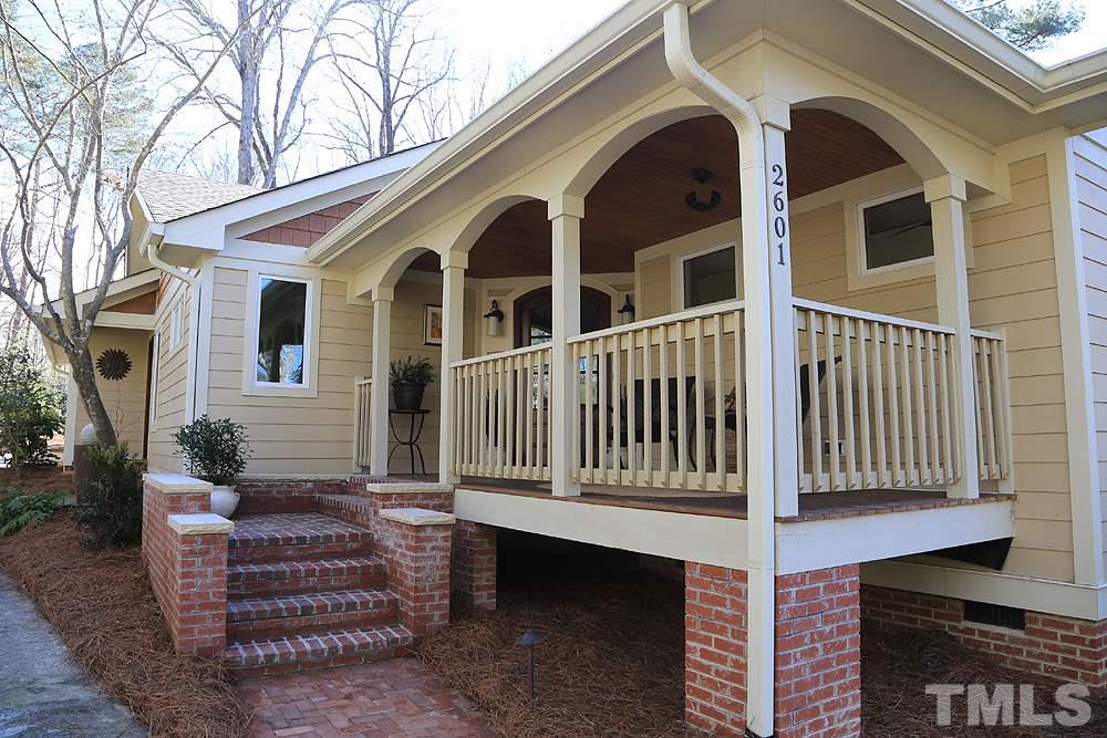 2601 Salisbury Plain Raleigh, NC 27613 - Photo 3 of 30 a front view of a house with a porch