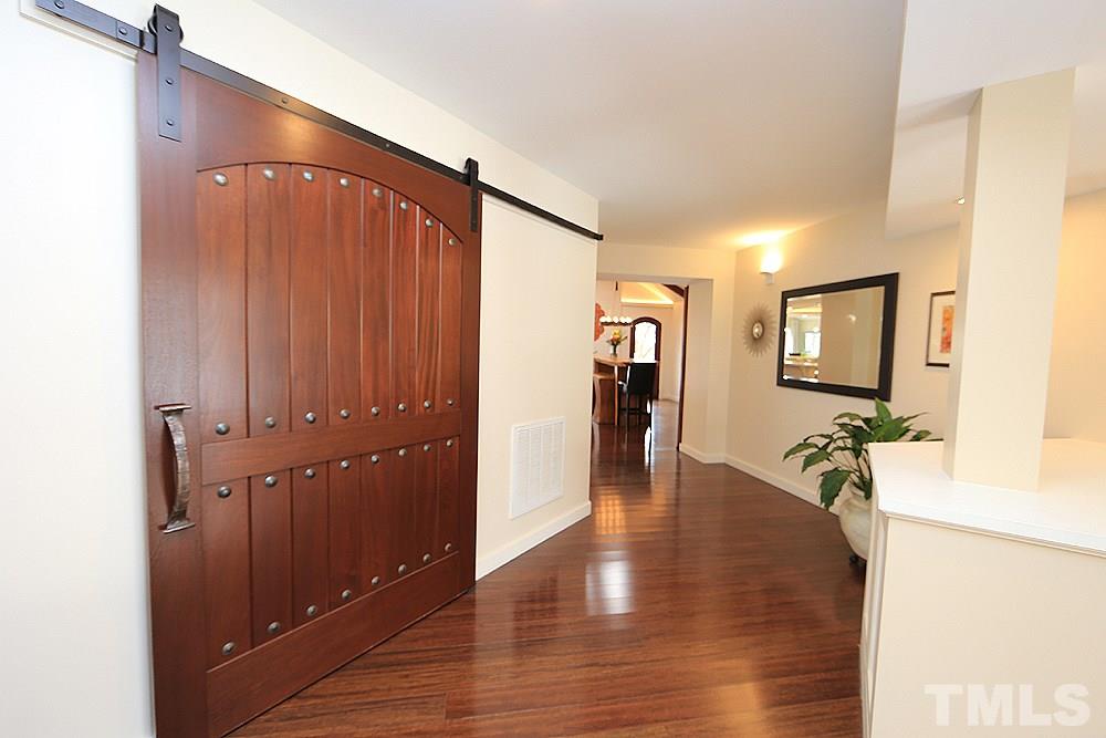 2601 Salisbury Plain Raleigh, NC 27613 - Photo 5 of 30 a view of a hallway with wooden floor