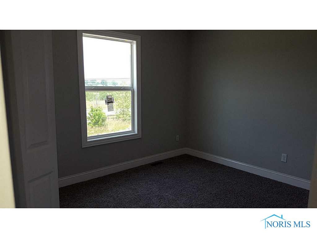 136 Lawai Road Oregon, OH 43616 - Photo 7 of 9 Bedroom.