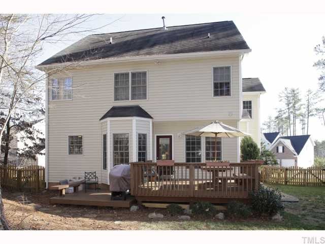 2501 Sugar Maple Court Raleigh, NC 27615 - Photo 11 of 12 a front view of a house with a yard