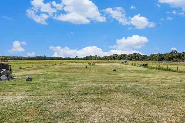 a view of a lake with a big yard