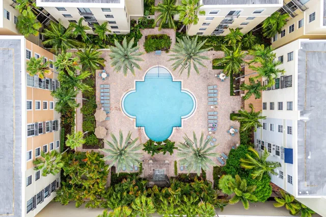 a view of a swimming pool with a chair
