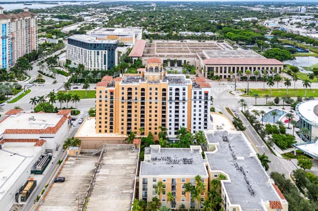 a view of a kitchen with a table and chairs