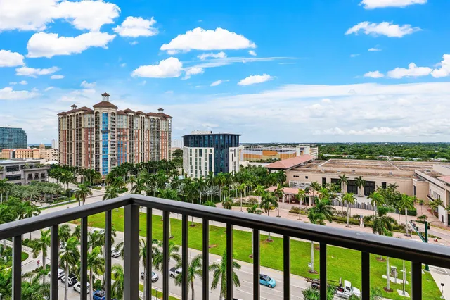 an aerial view of multiple house with a swimming pool