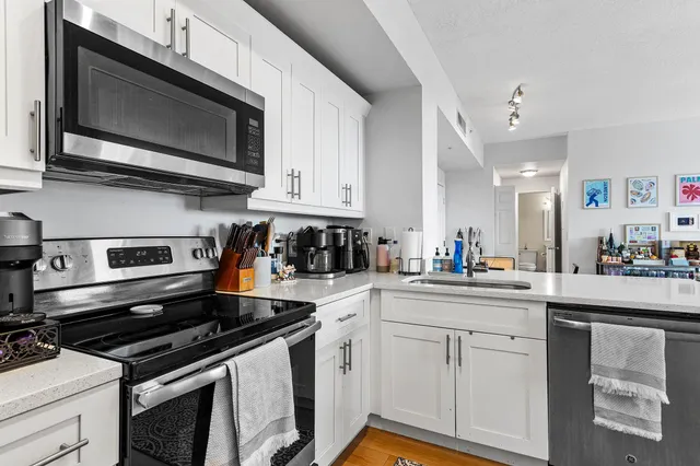 a room with a couch and a flat screen tv