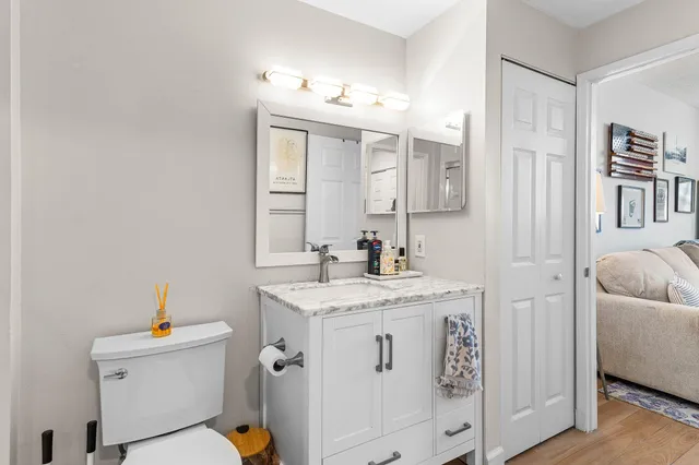 a view of a livingroom with furniture and a table
