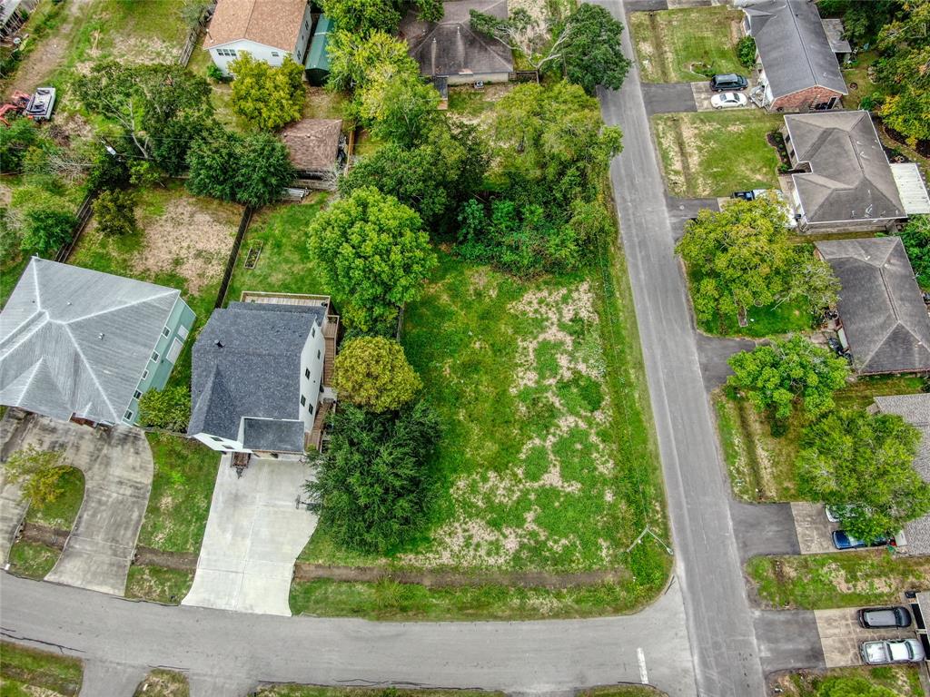 an aerial view of house with yard