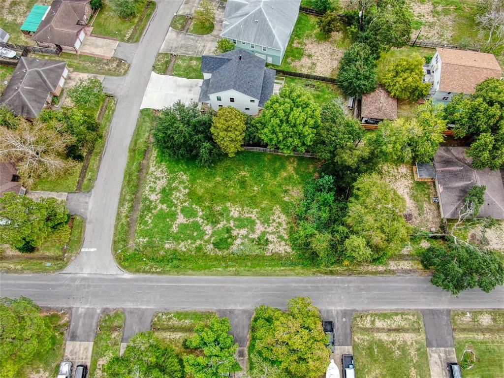 2213 Rimrock Street League City, TX 77565 - Photo 4 of 9 an aerial view of a house with a yard and large tree