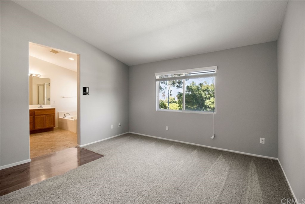 28346 Saddlecrest Street Menifee, CA 92585 - Photo 16 of 35 an empty room with windows