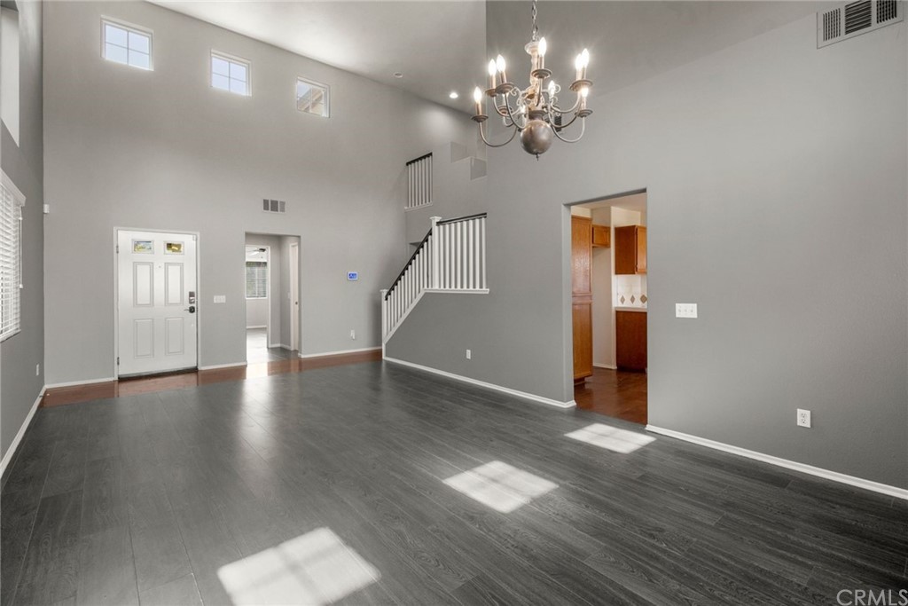 28346 Saddlecrest Street Menifee, CA 92585 - Photo 8 of 35 a view of a livingroom with wooden floor