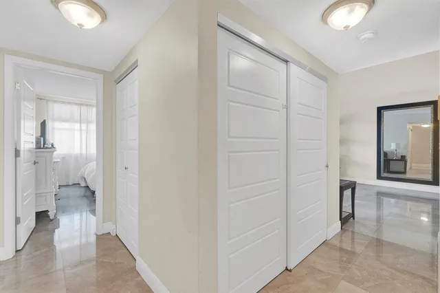 a view of a bathroom from the hallway