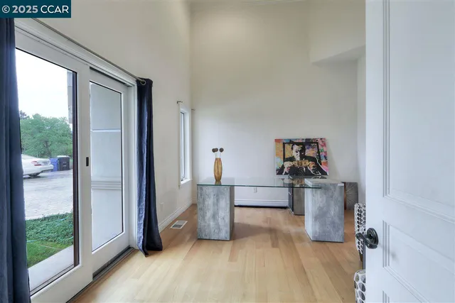 a view of a hardwood floor in a room