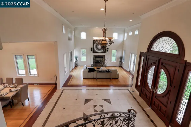a view of a living room and dining room