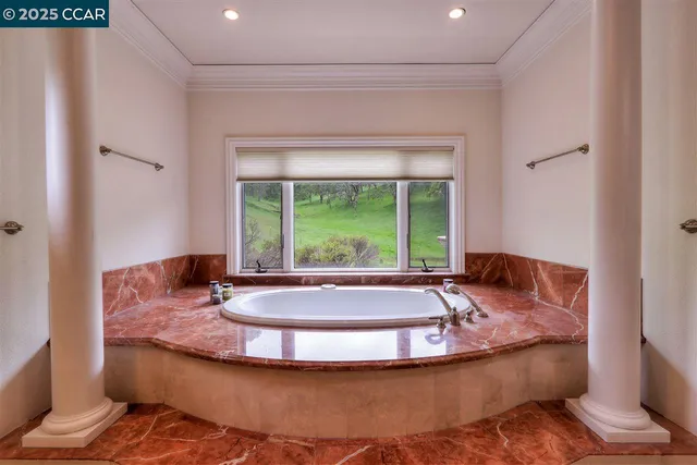 a view of a bathtub in a room