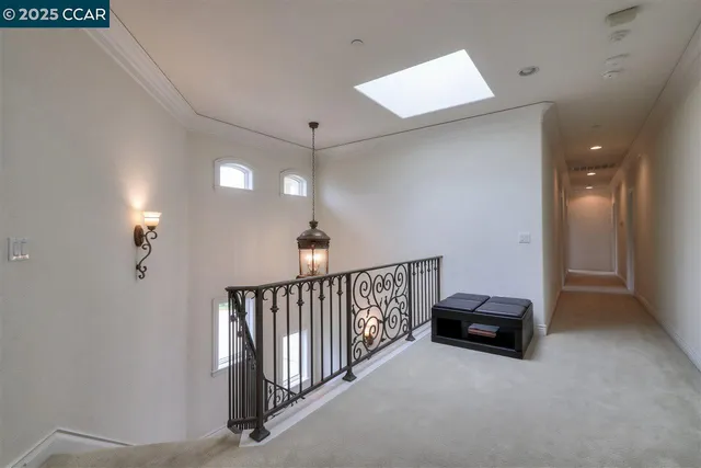 a view of a hallway with workspace