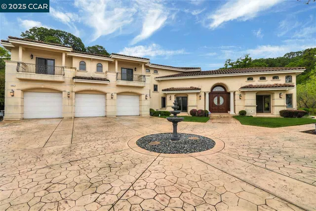 a front view of a house with entertaining space