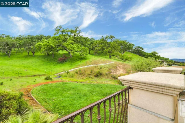 a view of a field with an outdoor space