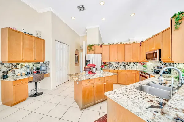 $999,900 | 6169 Northwest 53rd Circle, Coral Springs, FL 33067
