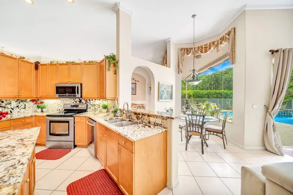 $999,900 | 6169 Northwest 53rd Circle, Coral Springs, FL 33067