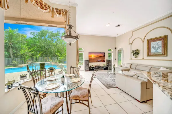 $999,900 | 6169 Northwest 53rd Circle, Coral Springs, FL 33067