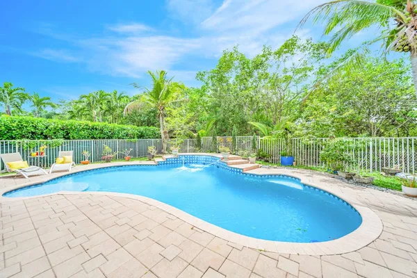 $999,900 | 6169 Northwest 53rd Circle, Coral Springs, FL 33067
